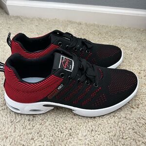 Black and Red Sneakers with Breathable Mesh and White Midsole